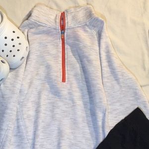 Orange and white zip up